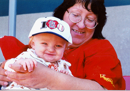 Emily in her baseball cap with Mema