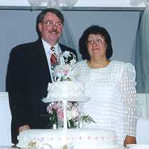 us_behind_cake.jpg (6679 bytes)