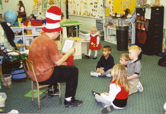 "Uncle Dude" reads to the class.
